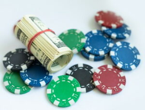 casino poker chips and bundle of cash