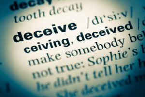 deceive word dictionary close up