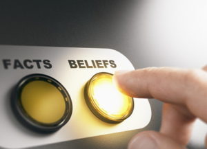 fact and belief button belief button lit up with finger pressing it