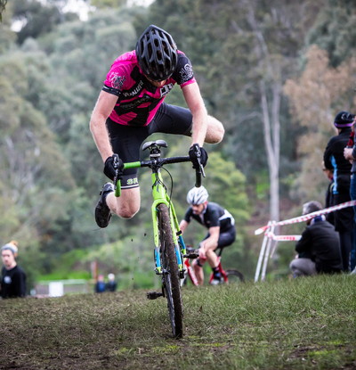 rider launched from bike in cyclo-cross race