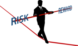 risk vs reward man on a tightrope