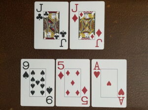 sacry board poker holding jacks with nine five ace on board