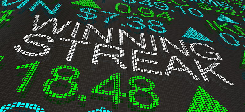 winning streak written on stock market board